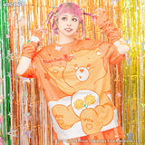 CARE BEARS T-SHIRT ORANGE *LIMITED TO CERTAIN COUNTRIES